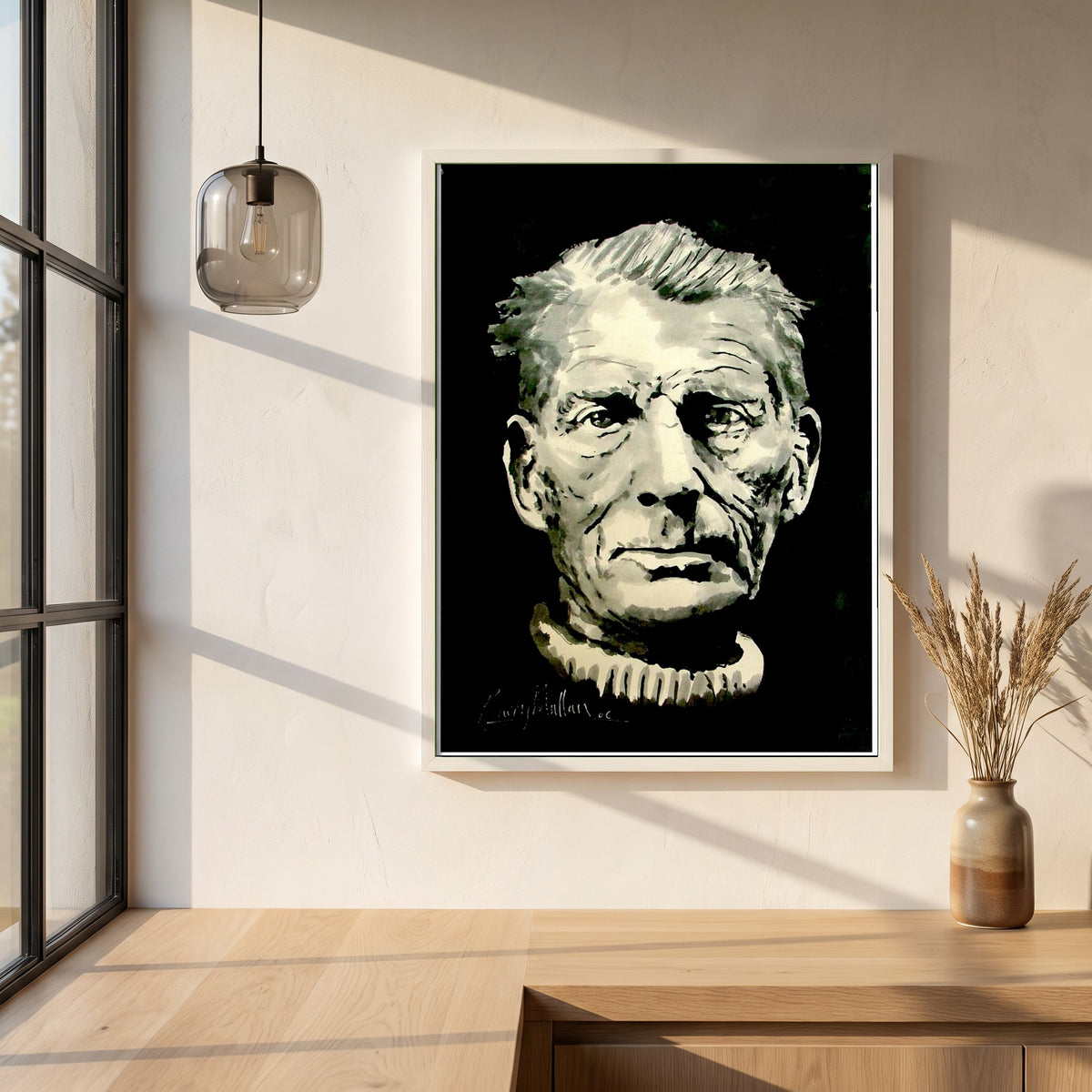 Samuel Beckett framed print in a white frame on a plaster wall above an oak worktop in a bright Scandinavian kitchen
