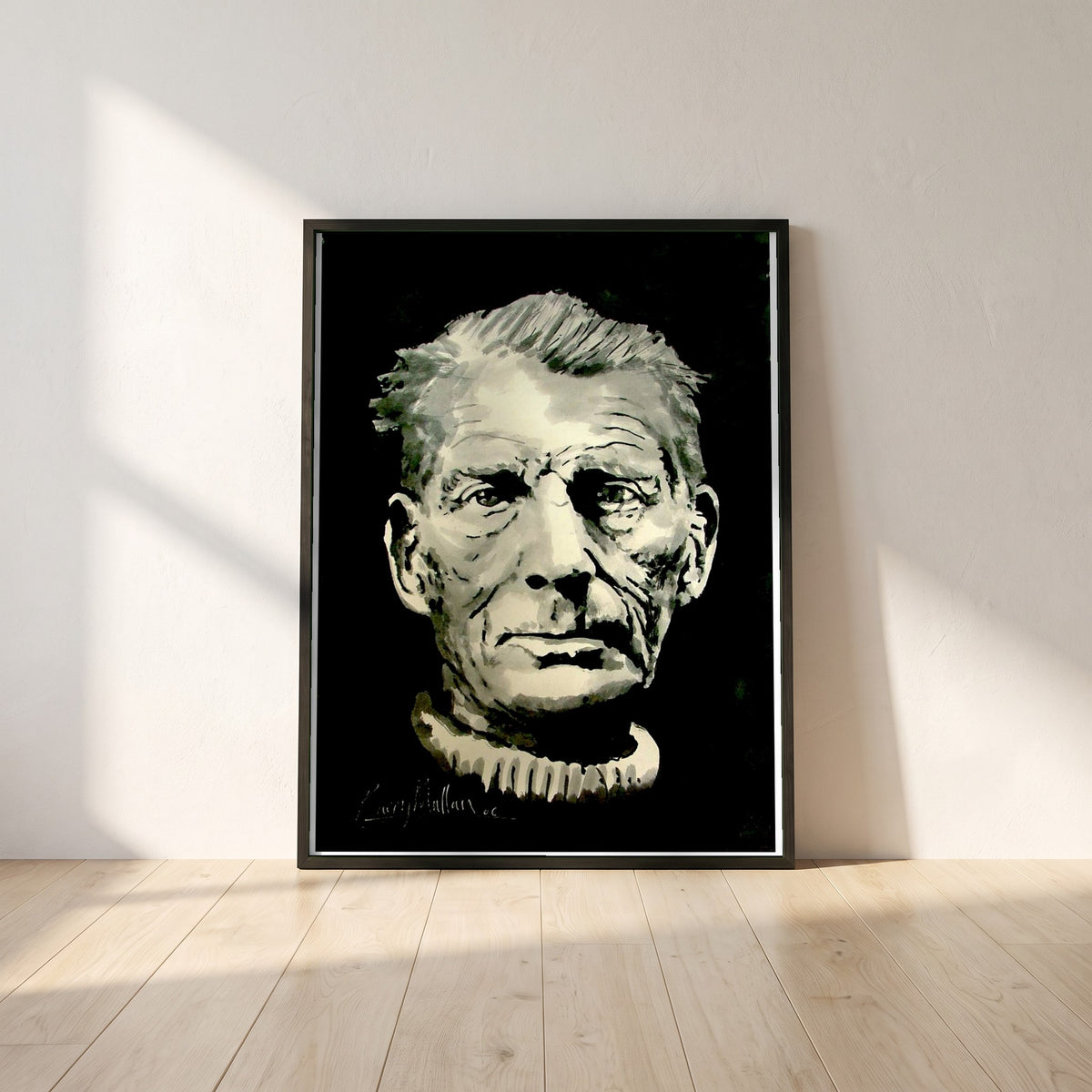 Samuel Beckett framed print in a black frame leaning against a white plaster wall on oak floorboards in morning light