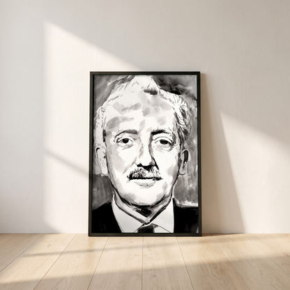 Sean Ó Riada framed print in a black frame leaning against a white plaster wall on oak floorboards in morning light