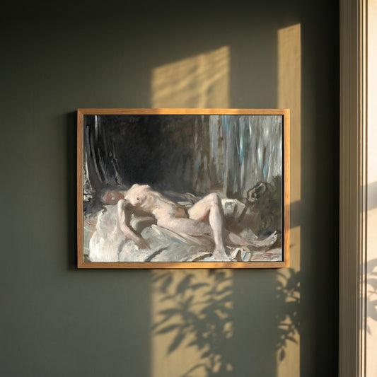 Reclining Female Figure framed print in a natural oak frame on a dark green wall beside a window, dappled plant shadow