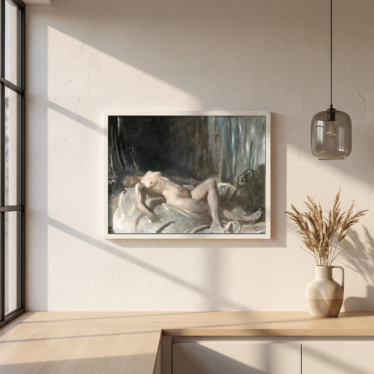 Reclining Female Figure framed print in a white frame on a plaster wall above an oak worktop in a bright Scandinavian kitchen