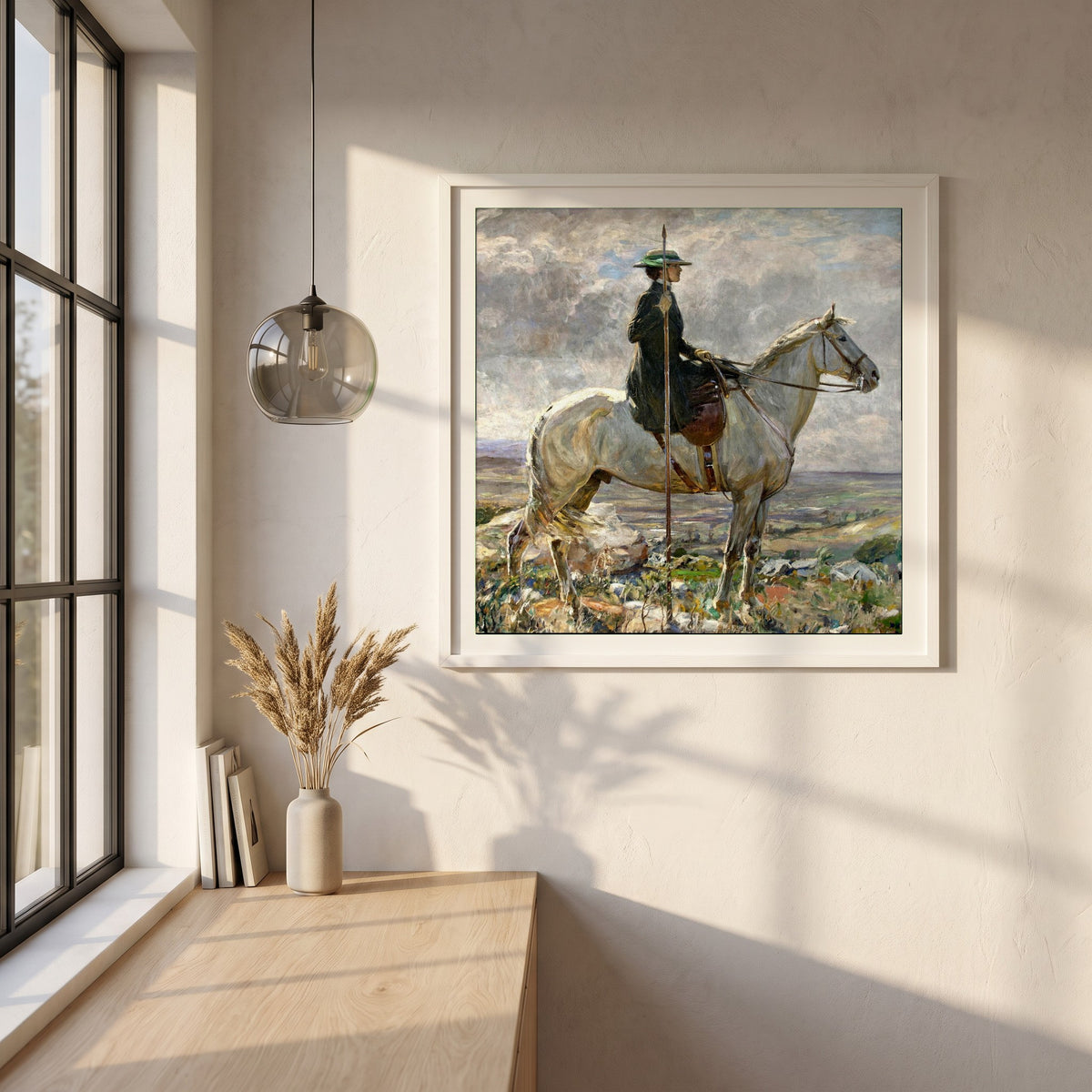 The Amazon framed print in a white frame on a plaster wall above an oak worktop in a bright Scandinavian kitchen