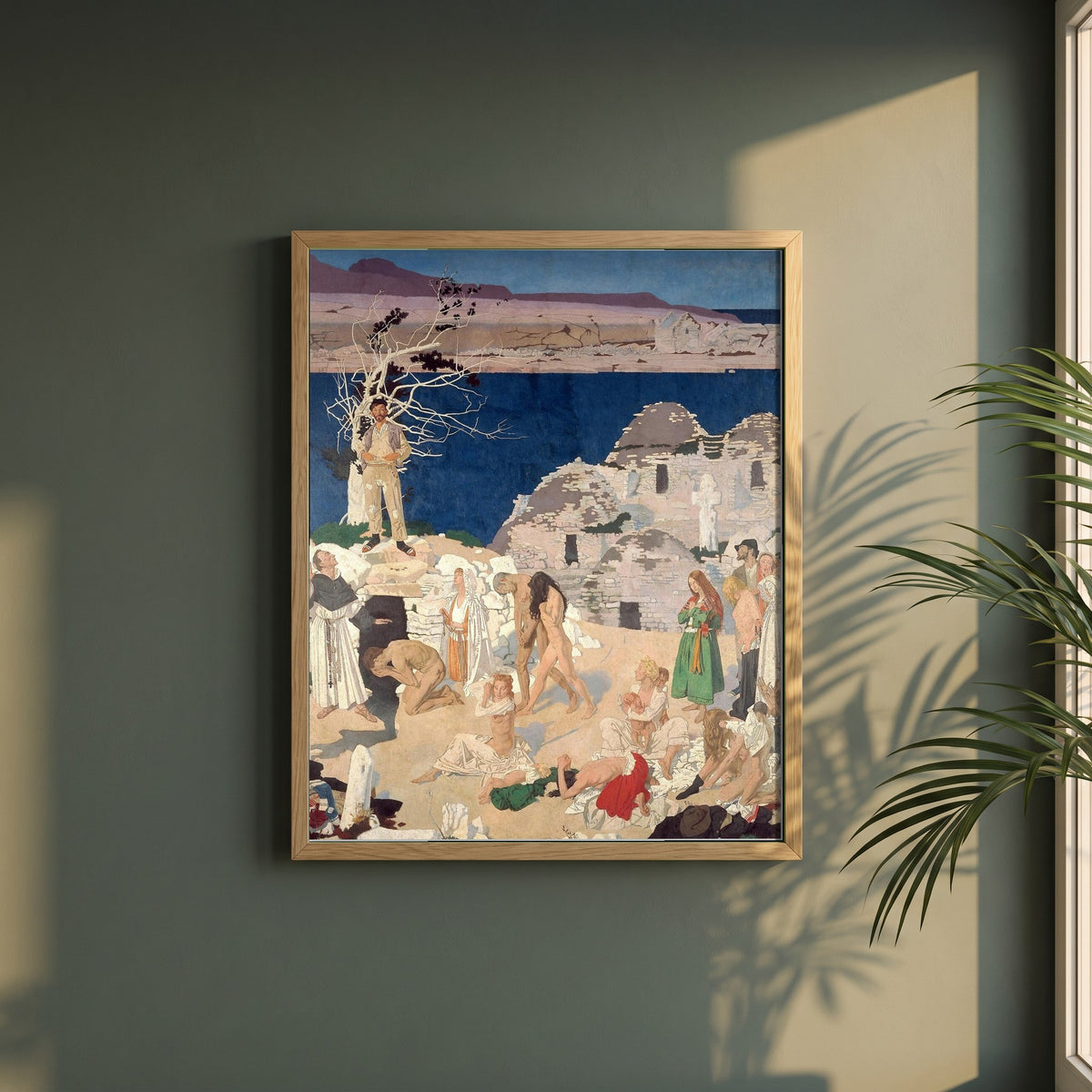 The Holy Well framed print in a natural oak frame on a dark green wall beside a window, dappled plant shadow