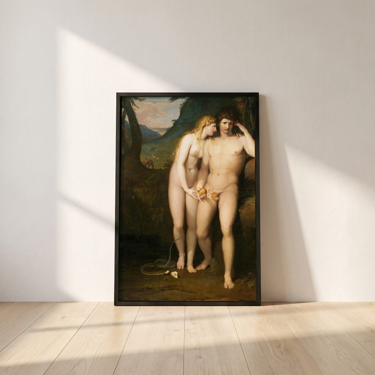 The Temptation of Adam framed print in a black frame leaning against a white plaster wall on oak floorboards in morning light