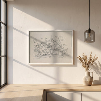 The Walls of Dublin framed print in a white frame on a plaster wall above an oak worktop in a bright Scandinavian kitchen