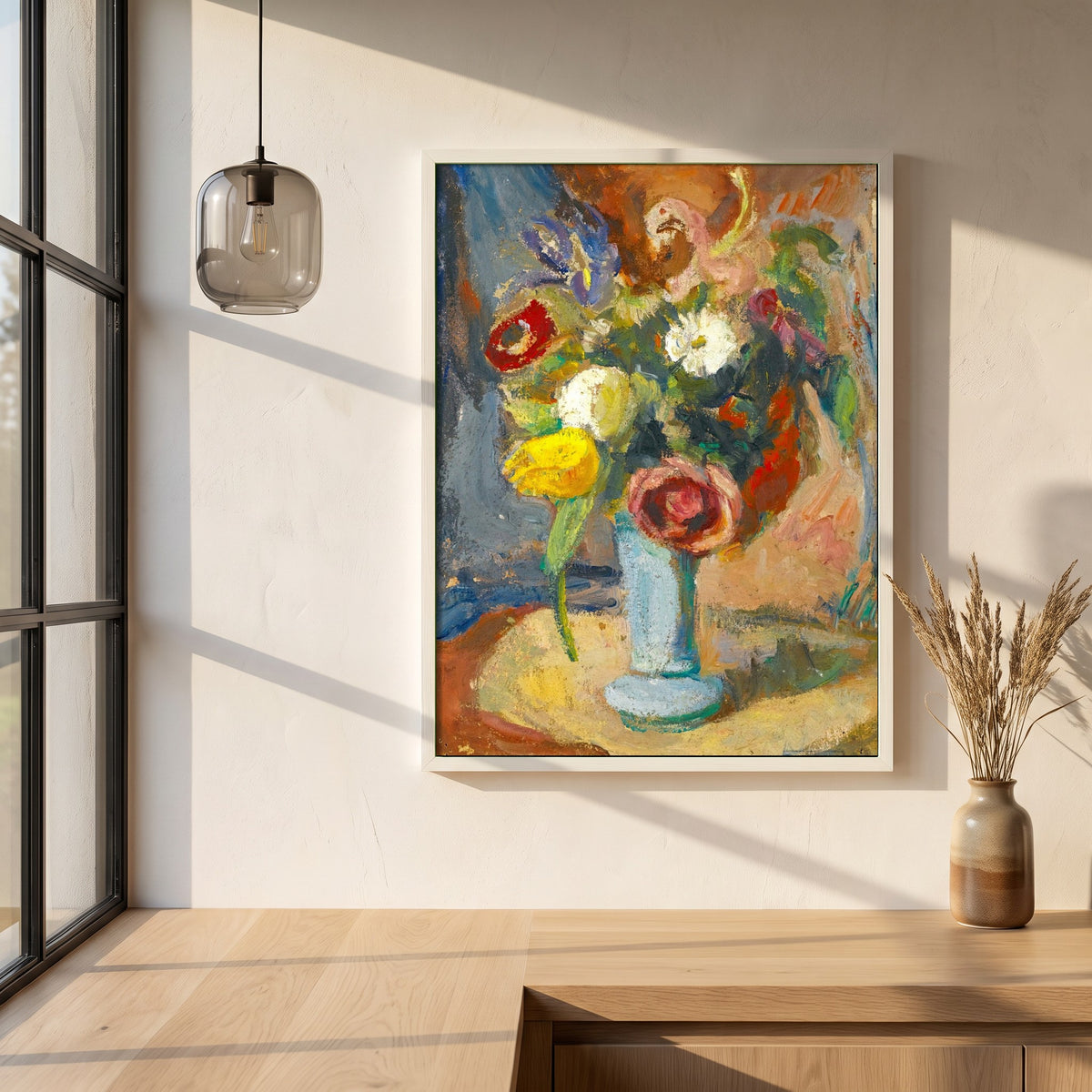 Still Life with Flowers framed print in a white frame on a plaster wall above an oak worktop in a bright Scandinavian kitchen