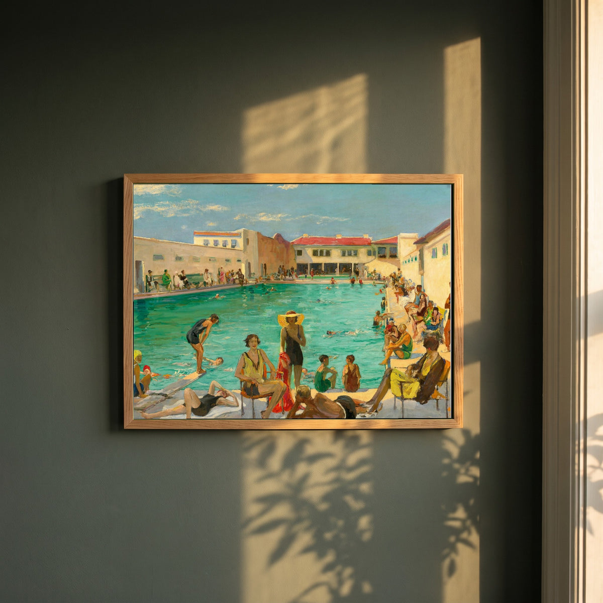 Winter in Florida framed print in a natural oak frame on a dark green wall beside a window, dappled plant shadow