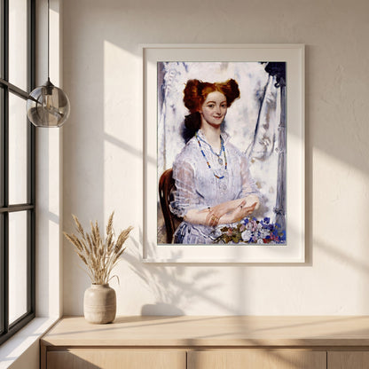 Young Ireland framed print in a white frame on a plaster wall above an oak worktop in a bright Scandinavian kitchen